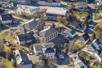 Aerial view, construction site with new building for new senior citizens' residential home on