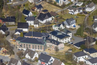 Aerial view, construction site with new building for new senior citizens' residential home on
