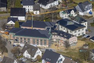 Aerial view, construction site with new building for new senior citizens' residential home on