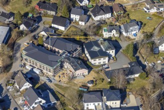 Aerial view, construction site with new building for new senior citizens' residential home on