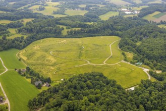 Aerial view, open space green area Am Wasserturm, hilly landscape with forest area, cycle paths and