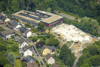 Aerial view, construction site new building Rewe supermarket Denkmalstraße, roof with solar panels,