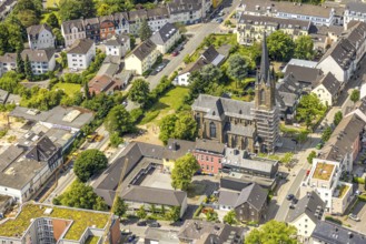 Aerial view, construction site catholic church St. Suitbertus with scaffolding on the church tower,