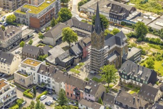 Aerial view, construction site catholic church St. Suitbertus with scaffolding on the church tower,