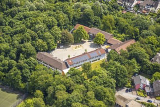 Aerial view, St. Suitbertus Municipal Catholic Primary School with schoolyard, roof with solar