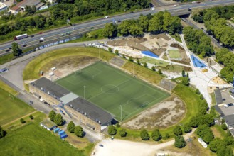 Aerial view, Glückauf Kampfbahn football stadium at Ernst-Kuzorra-Platz with construction site and