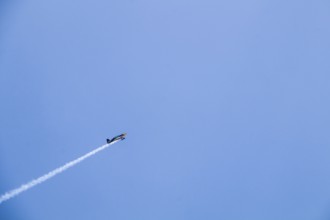 Turkish Air Force helicopters and fighter jets perform aerobatic maneuvers during Teknofest