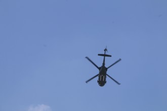 Turkish Air Force helicopters and fighter jets perform aerobatic maneuvers during Teknofest