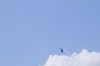 Turkish Air Force helicopters and fighter jets perform aerobatic maneuvers during Teknofest