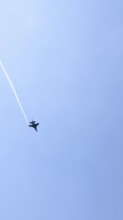 Turkish Air Force helicopters and fighter jets perform aerobatic maneuvers during Teknofest