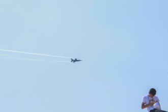 Turkish Air Force helicopters and fighter jets perform aerobatic maneuvers during Teknofest