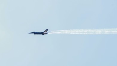 Turkish Air Force helicopters and fighter jets perform aerobatic maneuvers during Teknofest