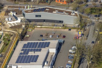Aerial view, construction site and new sports building and integration building on the corner of