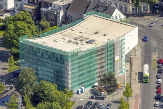 Aerial view, renovation of the municipal music school, construction site with scaffolding and