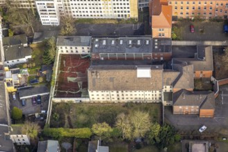 Aerial view, Munckelstraße, former Gelsenkirchen prison and sports field with weathered roofing,