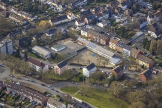 Aerial view, Maltese school with schoolyard, residential area apartment blocks, Neustadt,