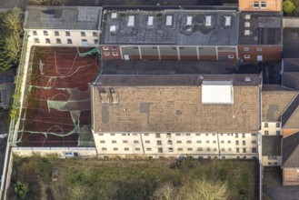 Aerial view, Munckelstraße, former Gelsenkirchen prison and sports field with weathered roofing,