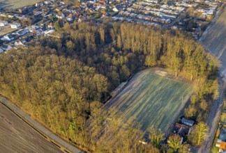 Aerial view, wooded area with shadows cast by trees on the football pitch Am Sportplatz corner An