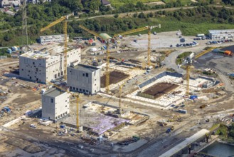 Aerial view, construction site with new construction of electrical switching houses for direct