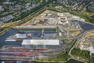 Aerial view, construction site with new construction of electrical switching houses for direct