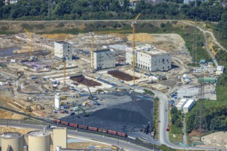 Aerial view, construction site with new construction of electrical switching houses for direct