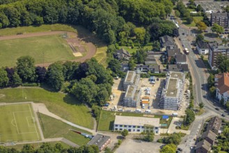 Aerial view, construction site on a former sports facility, residential area new construction and