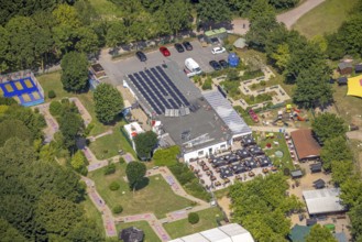 Aerial view, water skiing facility and leisure centre at Toeppersee, gastronomy with sunshades,