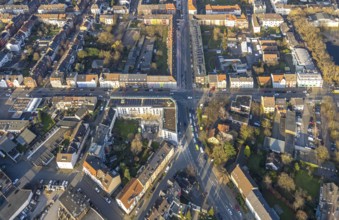 Aerial view, residential area and construction site with new residential building on the corner of