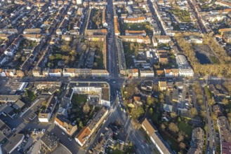 Aerial view, residential area and construction site with new residential building on the corner of
