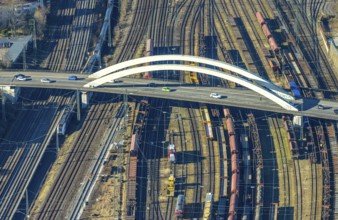 Aerial view, bridge Fuhrparkstraße over the railway tracks at the main station, goods trains,