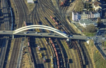 Aerial view, bridge Fuhrparkstraße over the railway tracks at the main station, goods trains,