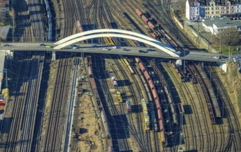 Aerial view, bridge Fuhrparkstraße over the railway tracks at the main station, goods trains,
