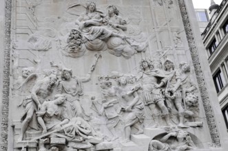 Detailed stone relief with several figures and ornate elements, London, England, Great Britain
