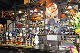London, England, Great Britain, Interior view of a traditional pub bar with various drinks, London,