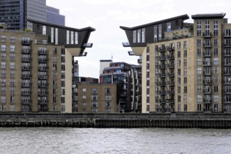 London, England, Great Britain, Europe, Modern residential buildings with unique roof shapes on the