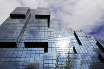 London, England, Great Britain, Modern glass building reflecting the sky and clouds, London,