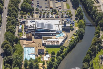 Aerial view, Olpe leisure pool, outdoor and indoor swimming pool with sun loungers and water slide,