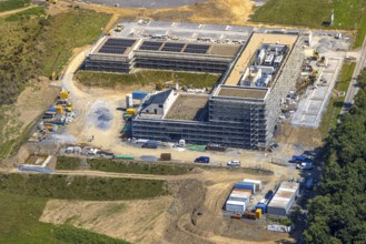 Aerial view, construction site and new building with scaffolding Hazard Prevention Centre (GAZ) of