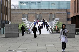 Millenium Bridge, behind TATE MODERN, London, England, Great Britain, Europe, Cityscape with people