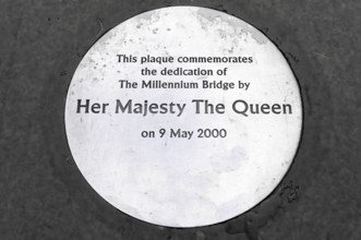 Plaque commemorating the inauguration of the Millennium Bridge by the Queen on 9 May 2000, London,