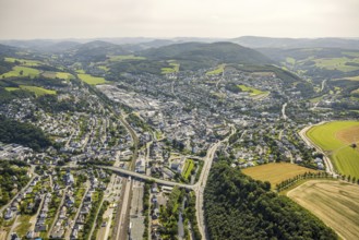 Aerial view, townscape with federal road B55 Antoniusbrücke and railway station, hilly landscape,