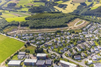 Aerial view, construction site, construction road An der Sündelt for planned new development area,