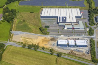 Aerial view, industrial area Enste-Süd with solar park Enste at the motorway A46, construction site