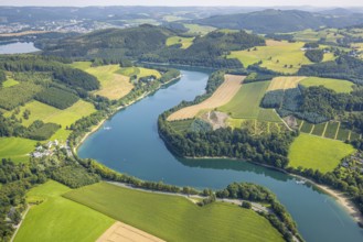 Aerial view, Hennesee and wooded hilly landscape, below H1 am See restaurant with green roof, sandy