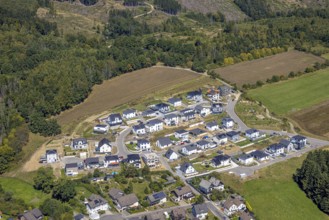 Aerial view, construction site and new construction of single-family houses, housing estate