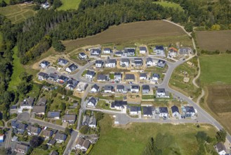 Aerial view, construction site and new construction of single-family houses, housing estate