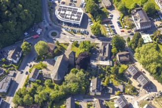 Aerial view, residential area at St Joseph's Church, Ford Kneifel car dealership with solar roof,