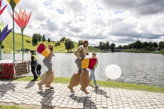 Lifeguards on stilts at the Superbloom Festival, Day 1 in the Olympic Park, Munich, 30/08/2025