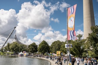 Visitors on the way between the stages at the Superbloom Festival, Day 1 in the Olympic Park,