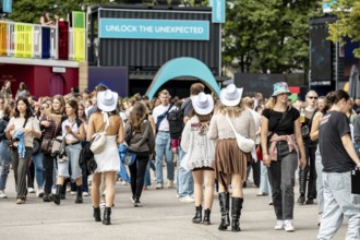 Festival visitors enter the Olympic Stadium at the Superbloom Festival, Day 1 in the Olympic Park,